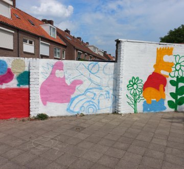 Leerlingen van VSO Parcours ontwerpen en schilderen rechtstreeks op de muur