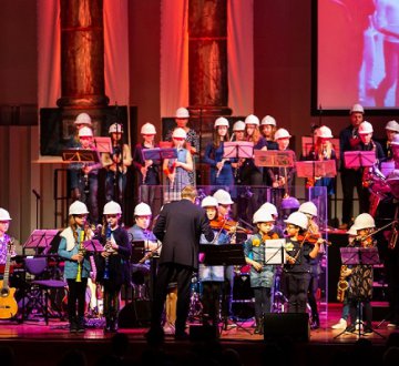 Orkest L' Aventure Noord  is in 2016 ontstaan uit een samenwerkingsproject van basisscholen in Tilburg-Noord, Factorium en Art-Fact. Het doel van dit project was om zoveel mogelijk kinderen te laten kennismaken met muziek maken en te laten samenspelen. Dit heeft geleid tot veel spetterende concerten in Tilburg tijdens festivals voor de wijk in Tilburg-Noord, Spoorpark en Reeshof en uitdagende projecten in samenwerking met Theatercollectief EELT. Het orkest treedt ook jaarlijks op in het voorprogramma van het projectorkest in de Concertzaal. Het orkest staat onder leiding van Peter-Paul van Esch.