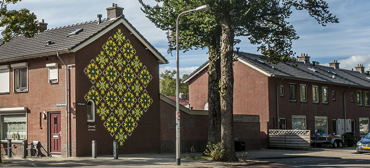 muurschildering Art-fact Buurtcultuur Tilburg Textielplein Dessinateurstraat Joep van Gassel